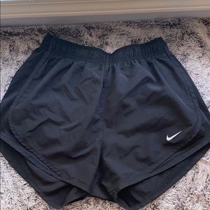Black Nike running shorts